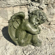 Sleeping Cherub Statue Stained