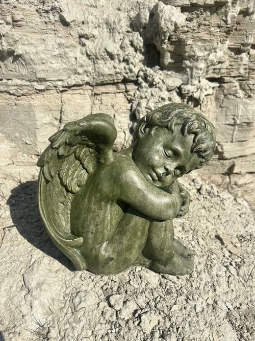 Sleeping Cherub Statue Stained