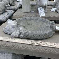 Concrete cat-shaped birdbath with sleeping cat design